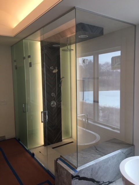 Custom Frameless Steam Enclosure with Satin Frost Toilet Room